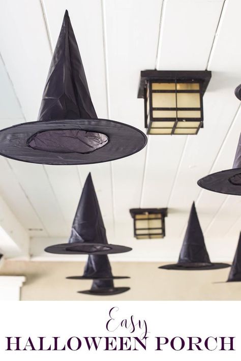 black witches hats hanging from the ceiling - a cute halloween decoration Witches Hats Hanging, Felt Leaf, Cheap Halloween Decorations, Hanging Witch, Witches Hats, Fairy Halloween Costumes, Halloween Front Porch Decor, Porch Decorations, Hanging Hats