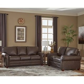 Chocolate Brown Chairs Living Room, Curtains For Brown Couch, Tan And Brown Living Room, Brown Chairs Living Room, Colors That Go With Brown Furniture, Leather Furniture In Living Room, Brown Sofa Living Room Color Schemes, Dark Brown Leather Sofa Living Room, Brown Leather Living Room Furniture