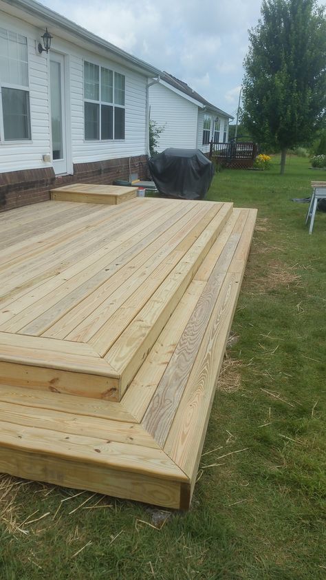 Back Yard Platform Deck - Picture 7045 | Decks.com Deck Low To The Ground, Platform Patio Deck, Small Platform Deck, Low Decks Backyard Ground Level, Wooden Patio Ideas, Platform Deck Ideas, Simple Deck Ideas, Deck Steps Ideas, Deck Step Lighting