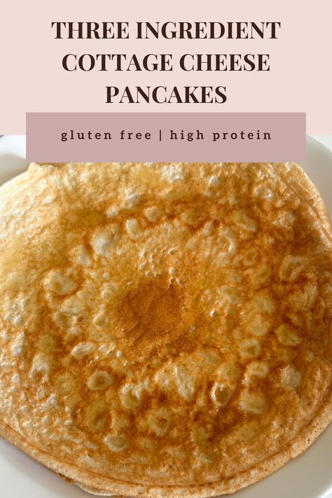 This easy, healthy three ingredient cottage cheese pancake is gluten free, low carb, low sugar, sugar free, high protein, and clean eating. On a large white plate is a large freshly cooked pancake. Golden brown with slightly crisp edges, perfectly round and a fluffy, soft texture that resembles a crepe. Protein Pancakes Recipe Cottage Cheese, High Protein Pancakes Cottage Cheese, Cottage Cheese And Oats Pancakes, Cottage Cheese Protein Powder Pancakes, Three Ingredient Pancakes, Good Culture Cottage Cheese Pancakes, Cottage Cheese Protein Pancakes, Gluten Free High Protein, Pancakes Gluten Free