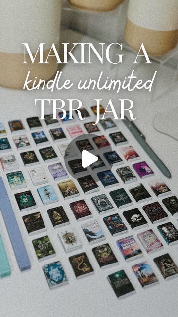 Mads Lewis on Instagram: "What’s your fav KU book?? help me fill up my TBR jar.   -all these KU covers are available on my website if you want to join me 🤗 first link in bio > covers are under the How-To mini books section-  59 mini books later ✨ I finally finished *a* TBR jar.  as bummed as I was that my gumball TBR machine didn’t pan out, this method is going to work out better for me!  Since I read with a mix of Libby, KU, Audible & some physical reads (sometimes all simultaneously😅) it’s nice that I can have separate jars for each category!  For now I have 59 KU books in my kindle unlimited jar! Can’t wait to keep adding more. I’m going to use the little jar for my physical reads, but I’m still not sure how to do a TBR jar for Libby since it’s hard to control what will be on hold or Book Jar Ideas, To Be Read Jar, Mini Jars Ideas, Tbr Prompt Jar Ideas, Tbr Jar Prompts, Tbr Jar Ideas, How To Make Mini Books, Book Jar, Tbr Jar