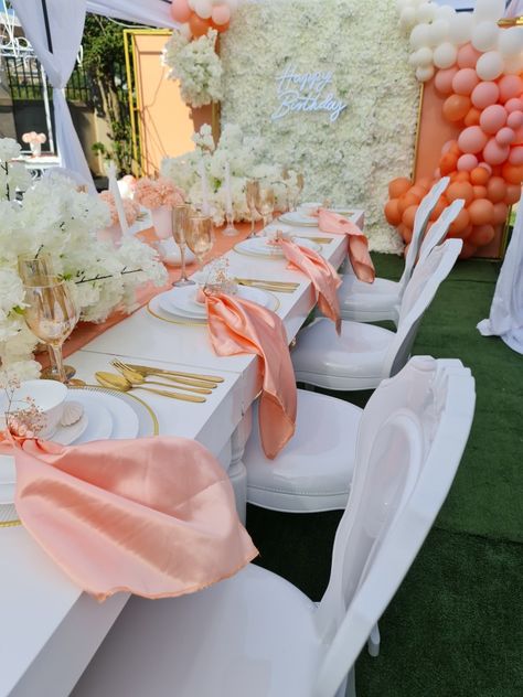 Balloon garland, neon sign, table scaping birthday Coral Color Birthday Theme, Coral Bridal Shower Ideas, Coral Birthday Decorations, Pink Bridal Shower Theme, Peach Party Decorations, Peach Bridal Showers, Table Scaping, Peach Decor, Stella Rosa