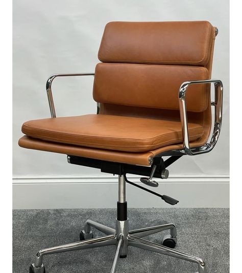 A low back 217 style office chair in a vintage tan aniline leather, on a polished chromed aluminium frame. Two padded back cushions and a padded seat cushion provide superb comfort. The chair has height, tilt and tension adjustment. It can be supplied with fixed glides instead of castor wheels if preferred.Aniline leather ('pull up' leather) will age beautifully with the right patina over use and time. Seat height is adjustable and at lowest setting is 48cm. At highest setting seat is 57cmFully Fiberglass Table, Scandinavian Style Furniture, Pod Chair, Mid Century Office Chair, Castor Wheels, Executive Office Chair, Board Room, High Back Office Chair, Office Chair Design