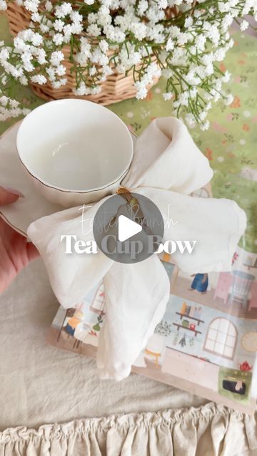 Stephanie Hanna on Instagram: "Make Easter Brunch extra special with tea cup bows or coffee cup bows. You don’t need fancy napkins to try this. Just buy the large dinner napkins at the grocery store and fold them this way. Such a fun little touch!   🫖 All links in my @shop.ltk and in my Amazon storefront!  🎀 Save this reel and share with your brunch loving friends! . . . . . #easterbrunch #brunchideas #easterideas #springbrunch #bowsonbows #bowseason #springparty #amazonhome #eastertable" How To Store Tea Cups, Tea Cup Decor Ideas, Tea Party Napkin Folding Ideas, Bridgerton Picnic, Strawberry Gardening, Fancy Napkins, Tea Party Tablescape, Soiree Ideas, Bridgerton Ball