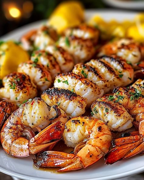 "WOULD YOU DIVE INTO THIS SIZZLING 🍤 Grilled Lobster and Shrimp 🦞? Savor the Freshness of the Sea! Quick to prepare, perfect for a busy lifestyle, and bound to impress at any family gathering. 🍽️ Ingredients 🍽️ - 4 tablespoons unsalted butter, melted - 1 teaspoon paprika - 1 tablespoon fresh parsley, chopped - 2 tablespoons fresh lemon juice - 4 cloves garlic, minced - 4 tablespoons olive oil - 1/2 teaspoon black pepper - 1 pound large shrimp, peeled and deveined - 2 lobster tails - 1/2 tea... Food Aversion, Lobster And Shrimp, Stadium Food, Brooklyn Food, Grilled Lobster Tail, Food Nyc, Sea Foods, Food Near Me, Grilled Lobster