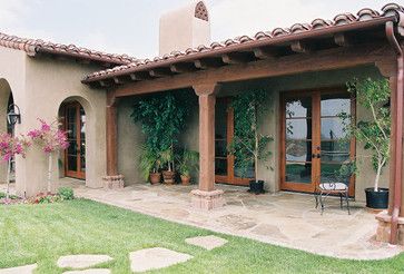 Stone style patio.  Adobe Ranch - mediterranean - exterior - san diego - laura_rosenthal Adobe House Exterior, Mediterranean Bedrooms, Spanish Ranch, Adobe Homes, Mediterranean Exterior, Hacienda Style Homes, Ranch Ideas, House Ranch, Boho Patio