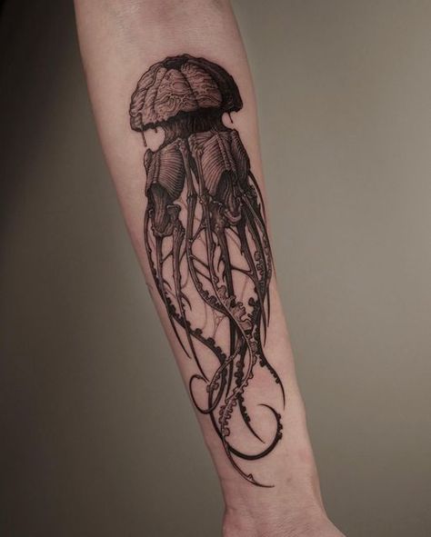 Discover the art of transformation with jellyfish tattoos in our article. Explore it and find 50+ stylish designs with meanings explained. Skeleton Jellyfish Tattoo, Scary Ocean Tattoo, Jelly Fish Hand Tattoo, Scary Jellyfish Tattoo, Gothic Jellyfish Tattoo, Jellyfish Calf Tattoo, Skeleton Jellyfish, Dark Jellyfish Tattoo, Arm Sleeve Ideas