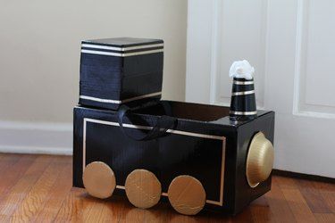 Polar Express Cardboard Train Boxes, Polar Express Train Box Car Ideas, Diy Ideas To Sell, Polar Express Kid, Cardboard Box Costume, Cardboard Boxes Kids, Costume Ideas Easy, Cardboard Train, Polar Express Christmas Party