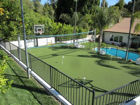 Pool, putting green, tennis court, basketball court - now that's a fun backyard! And almost all of it done with SYNLawn! Turf Basketball Court, Volleyball Court Backyard, Sports Backyard, Tennis Court Backyard, Playground Turf, Covered Pavilion, Magic Images, Backyard Court, Artificial Grass Backyard