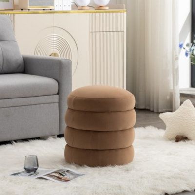 Decorate your home with this fabric storage Ottoman. It can be used as a footstool, footstool or seat. Richly decorated pleated fabric makes it the perfect decoration for any room. Latitude Run® Upholstery Colour: Coffee | Latitude Run® Soft Velvet Round Ottoman Footstool | PIMG2603 | Wayfair Canada