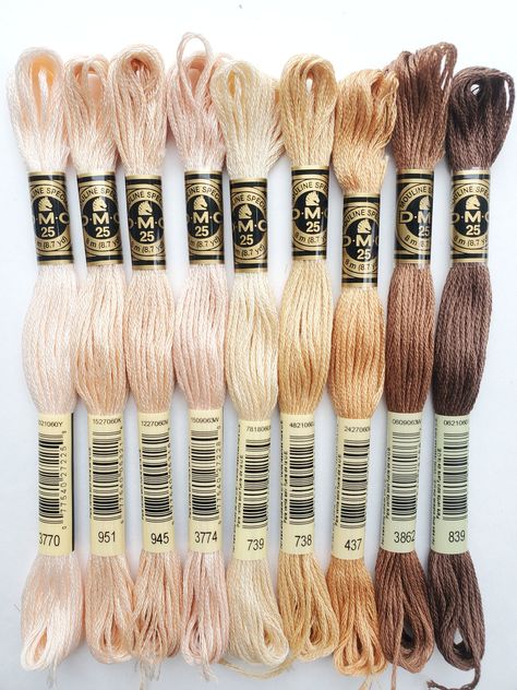 ❤ PRODUCT DETAILS ❤ DMC Set of Flosses- 8 Skeins DMC Art. 117 9 cotton skeins to inspired by the most used colors for skin.  Each skein measures (8m/8.7yds each) Made in France Colors included:  437 Light Tan 738 Very Light Tan 739 Ultra Very Light Tan 839 Dark Beige Brown 945 Tawny 951 Light Tawny 3770 Very Light Tawny 3774 Very Light Desert Sand 3862 Dark Mocha Beige ❤ WANT TO SEE MORE EMBROIDERY / CROSS STITCH FLOSS❤ We sell other embroidery threads in our store here: https://www.etsy.com/ca/ Dmc Floss Color Combinations, Dmc Floss Chart, Beige Embroidery, Cross Stitch Floss, Cross Stitch Tutorial, Dmc Embroidery, Cross Stitch Thread, Skin Colors, France Colors