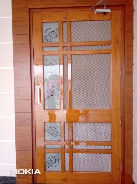 Wood Grill Door Design, Wooden Door Net Design, Jali Doors Wooden, Wood Net Door Design, Single Jali Door Design, Mesh Door Design Wooden Main Door, Door Net Design Modern, Door Jali Design Main, Net Doors For Main Door Modern