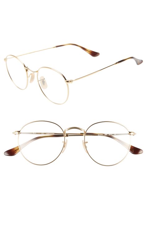 Shop Ray Ban 50mm Round Optical Glasses - Gold from 250+ stores, starting at €163. Similar ones also available. On SALE now! A rounded silhouette amplifies the retro-chic appeal of subtly textured metal frames styled with slim temples and an angular bridge. Style Name: Ray-Ban 50Mm Round Optical Glasses. Style Number: 5765239. Available in stores. Gold Rimmed Glasses, Specs Frame, Ray Ban Round Metal, Gold Eyeglasses, Fake Glasses, Round Ray Bans, Gold Glasses, Round Frame Sunglasses, Metal Glasses