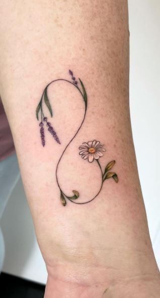 Stunning Infinity Tattoos, Designs, & Ideas - Tattoo Me Now Minimalist Tattoo Infinity, Intertwining Flower Tattoo, Infinity Tattoo Unique, Infinite Sign Tattoo, Infinity Tattoo Flowers Design, Infinity Shamrock Tattoo, Infinity Tulip Tattoo, Orchid Infinity Tattoo, Dandelion Infinity Tattoo