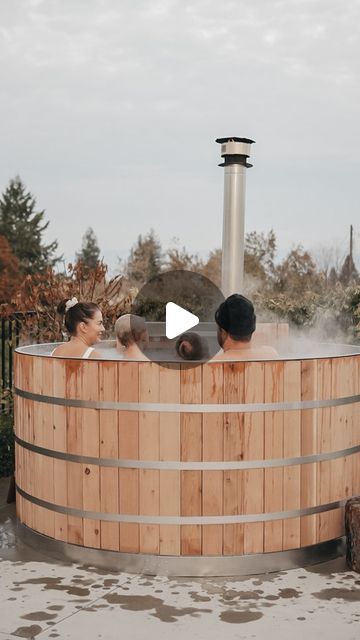 Justin Pasutto on Instagram: "Escaping to our handcrafted wood fired hot tub from @alumitubs is a true family adventure. The crackling flames and the warmth of the fire create an irresistible oasis of relaxation. From starry nights to lazy Sundays, every moment spent in this rustic wonder is an opportunity to bond and cherish unforgettable memories. Discover the bliss of nature’s embrace with our wood fired hot tub, where family moments become extraordinary. #woodfiredhottub #alumitub #oasis" Wood Fired Hot Tub Diy, Natural Hot Tub, Wood Fired Hot Tub, Horse Trough, Hot Tub Landscaping, Cedar Hot Tub, Sauna Benefits, Diy Hot Tub, House Yard