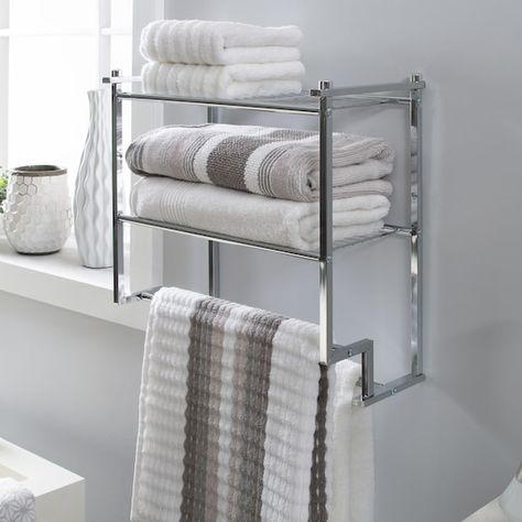 Shop Organize It All 2-Tier Wall Mounted Shelf & Towel Rack at Michaels. com. This attractive storage solution will spruce up your bathroom and keep things calm and organized. Add a stylish touch to your bathroom with this wall mounted shelf and towel bar. The perfect addition to create space and style. Sturdy wire shelves and a towel bar on the bottom. Use the shelves for décor or storing towels and bath products, maximizing the space in your bathroom. Designed with a chrome finish making t Chrome Bathroom Shelves, Fireplace Shiplap, Bathroom Downstairs, Redecor Game, Wall Towel Racks, Storing Towels, Shelves Ideas, Wire Shelves, Wall Mounted Towel Rack