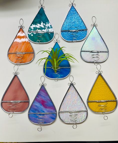 Stained glass air plant holder, various colors. plant is not included Stained Glass Plant Holder, Stained Glass Air Plant Holders, Stained Glass Keychain, Stained Glass Propagation Station, Stain Glass Diy, Air Plant Wall Display, Stained Glass Plant Stakes, Stained Glass Display, Glass Air Plant Holder