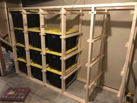 I Standardized All My Storage Bins But Got Tired Of Unstacking/Restacking Every Time I Needed Something From The Bottom Bin. I Built This Rack So Each Bin Can Slide Out, And It Wastes Very Little Storage Space. What Do You Think? Slide Out Storage Bins, 2x4 Garage Storage, Floating Bin Storage, Attic Bin Storage, Totes Storage Shelves, Shed Interior Ideas Storage, 10x12 Storage Shed Organization Ideas, Storage Shelves For Totes, Costco Bin Storage