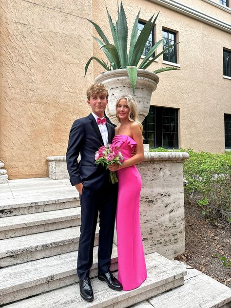 Black Suit Pink Tie Prom, Pink Prom Dress And Suit, Navy And Pink Prom Couples, Pink Prom Inspo Couple, Fuschia Prom Couple, Hot Pink Prom Dress Couple, Prom Couples Pink, Bright Pink Prom Couple, Couples Homecoming Pictures