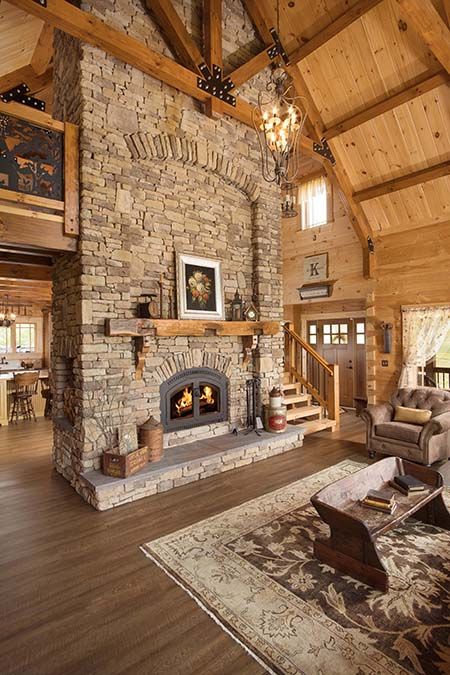 Stone Fireplace With Cathedral Ceiling, Cabin Beams Ceilings, Living Room With Big Fireplace, Fireplace In Middle Of Open Floor Plan, Log House Interior Modern, Modern Log Cabin Homes, Cathedral Fireplace, Log Homes Interiors, Wood House Kitchen