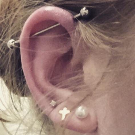 These are my own ear piercings! Triple lobes on both sides, and my industrial bar on my left ear. I also have a nostril piercing. Triple Lobe And Industrial Piercing, Left Ear Piercings, Bar Piercing Ear, Industrial Piercing Aesthetic, Bar Ear Piercing, Triple Lobe Piercing, Scaffolding Piercing, Bridge Piercing, Nostril Piercing