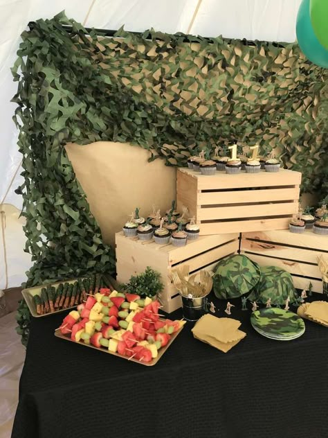 Jaydan’s Boot Camp | CatchMyParty.com Army Party Table Decorations, Army Backdrop Party Ideas, Boot Camp Theme Party, Army Soldier Birthday Party, Kids Army Birthday Party, Army Retirement Party Ideas For Men, Boot Camp Decorations, Army Centerpiece Ideas, Army Decorations Party