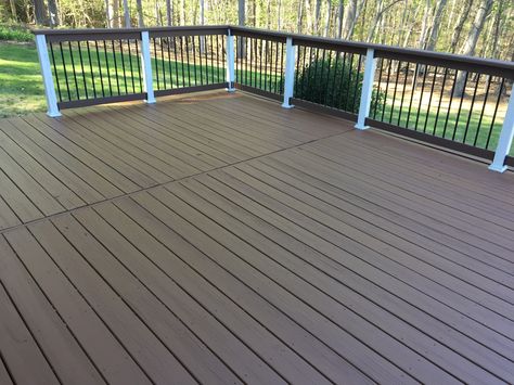 Did the deck today and love the double shade deck paint colors. Behr chocolate on deck with behr white and behr wood chip on railing . Taupe Deck Paint, Black Wood Deck, Deck Painting Ideas Wood, Deck Paint Ideas, Wood Deck Colors, Deck Over Paint, Painted Wood Deck, Stain Deck, Deck Painting