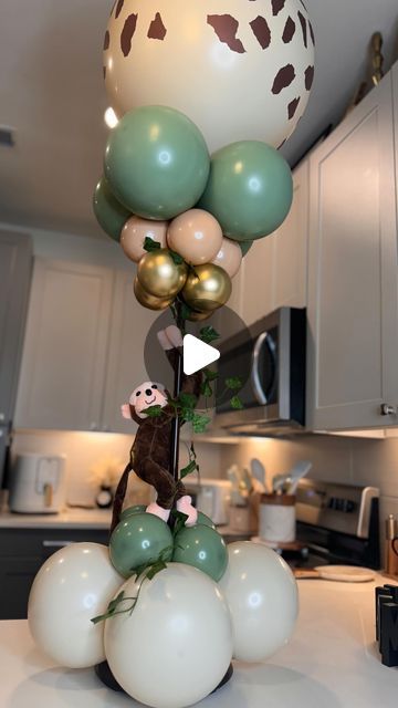 WreathSavvy by Staci on Instagram: "Make a safari themed balloon centerpiece w/ me!  Don’t ask me how I did it! 😜 @wreathsavvy 🎀 Nah but fr… I used the viral Walmart lamp stand as my base. #wreathsavvy #ballooncenterpieces #ballooncenterpiece #safaritheme #jungletheme #dontaskmehowididit #itwashard" Safari Theme Centerpieces, Jungle Centerpieces, Balloon Centerpieces Diy, Stick Centerpieces, Safari Centerpieces, Jungle Baby Shower Decorations, Balloon Baby Shower Centerpieces, Balloon Table Centerpieces, Safari Baby Shower Decorations