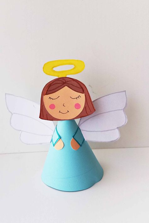 One of my favorite Christmas paper crafts for preschool is this cute angel craft!! Make your very own Christmas angel using my free printable template and instructions! One of the very easy Christmas crafts! Angel Projects For Kids, Angel Making Crafts, Toilet Paper Angel Craft, Shepherds And Angels Craft, Mary And Angel Gabriel Craft, Easy Angel Crafts For Kids, Guardian Angel Craft, Angel Craft Preschool, Christian Christmas Kids Crafts