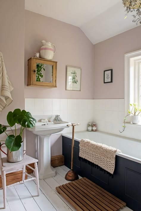 Pale pink walls, navy bath and vintage touches create a soothing tone to this bathroom. #georgian #georgianhome #homes #interiors #georgiancottage #cottage #interiors #interiorstyle #bathroom #bath #pinkbathroom Bathroom Paint, Cottage Bathroom, Bathroom Color, Rustic Bathrooms, Georgian Homes, Upstairs Bathrooms, Pink Bathroom, Bath Room, Bathroom Colors