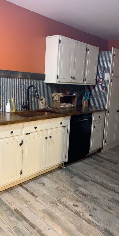 Corrugated Metal Backsplash with white cabinets Corrugated Metal Backsplash Kitchen, Corrugated Metal Island Kitchen, Corrugated Iron Splashback, Corrugated Metal Backsplash, Tin Countertops Galvanized Metal, Metal Backsplash Ideas, White Cabinets Tin Backsplash, Corrugated Tin Backsplash, Galvanized Steel Backsplash Kitchen