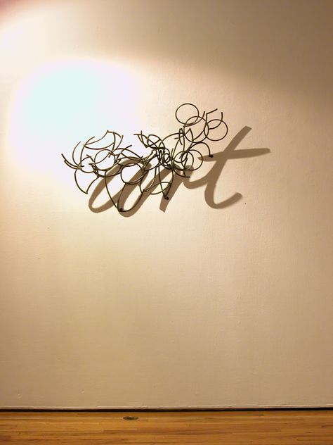 light  By Larry Kagan (http://larrykagansculpture.com/media/69/ok-harris-exhibit-2007-photo-gallery/) Shadow Sculpture, Cast Shadow, Illusion Kunst, Pinterest App, Shadow Art, Artist Bio, Light Sculpture, Illusion Art, Wire Art