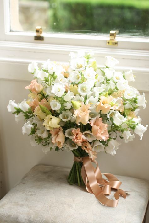 Simple bouquet of white campanula bells and peach eustoma. Eustoma Bouquet Wedding, Canterbury Bells Bouquet, Campanula Bouquet, White Peach Bouquet, Bell Flower Bouquet, Bellflower Bouquet, White Garden Bouquet, White Campanula, Eustoma Bouquet