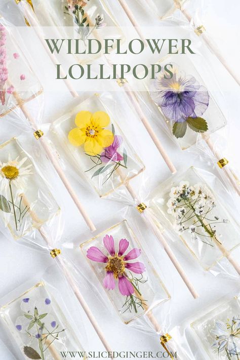 handmade wildflower lollipops available for purchase. Handmade Lollipops, Homemade Lollipops, Gourmet Lollipops, Wedding Baskets, Lollipop Recipe, Edible Flowers Recipes, Candy Flowers, Chocolate Lollipops, Gluten Free Treats