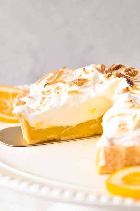 Flaky pie crust, buttery, tangy lemon filling topped with gold-tipped meringue, this vegan lemon meringue pie is just the perfect vegan dessert for any occasion. Vegan Lemon Meringue Pie, Vegan Lemon Meringue, Lemon Filling, Flaky Pie Crust, Lemon Meringue Pie, Meringue Pie, Lemon Meringue, Vegan Dessert, Pie Crust