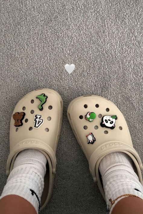 bone crocs | classic clog | beige crocs | jibbitz | croc charms | shoes | vibes | aesthetic | brown crocs | neutral colours | summer shoes Cool Crocs, Crocs With Jibbitz, Crocs Aesthetic, Crocs With Charms, Crocs Outfit, White Crocs, Crocs Fashion, Desain Quilling, Crocs Jibbitz