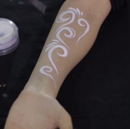 Art of Face Painting - How To Do Swirls and Curls Tutorial by Shelley Wapniak Mermaid Face Paint, Mime Face Paint, Curls Tutorial, Face Painting Tips, Glitter Tattoo Stencils, Homemade Face Paints, White Face Paint, Face Painting Tutorials, Arm Painting