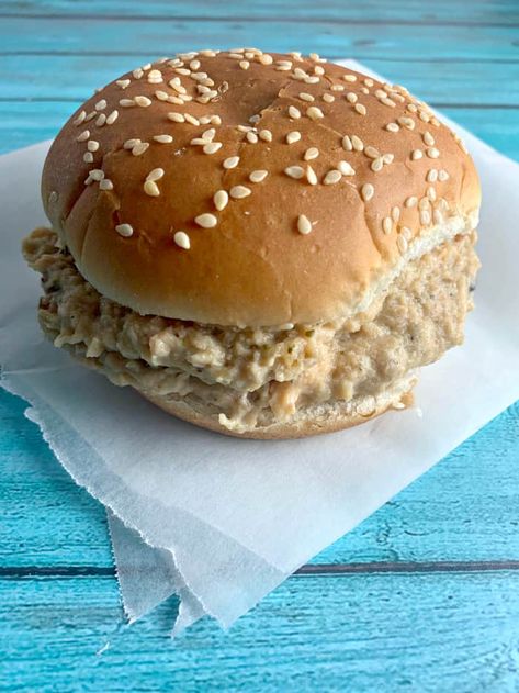 Crockpot Ohio Shredded Chicken Sandwiches are the delicious sandwich we used to order at the baseball field snack shack. Hot, creamy, shredded chicken piled on a soft hamburger bun... the perfect easy meal for your family or to feed a crowd!  #shreddedchicken #chickensandwich #tailgate Ohio Shredded Chicken Sandwiches, Ohio Shredded Chicken, Sandwiches Healthy, Shredded Chicken Sandwiches, Recipes Sandwiches, Hot Chicken Sandwiches, Chicken Sandwich Recipe, Recipe With Cream Cheese, Snack Stand