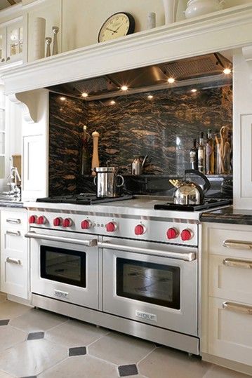 The Wolf range is recognizable for its signature red knobs, which also come in stainless... Double Oven Kitchen Layout, Wolf Kitchen, Kabinet Dapur, Kitchen Stove, Double Oven, Luxury Kitchens, Kitchen Inspo, Counter Tops, Kitchen Remodel Idea