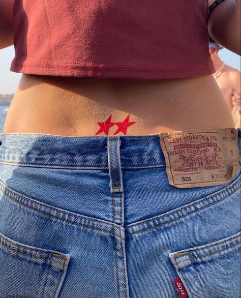 Lower Back Tattoos Stars, Red Ink Star Tattoo, Two Star Tattoo, Star Tattoo Stomach, Cool Star Tattoos, Dainty Red Tattoos, Red Tattoo Ideas Female, Red And Blue Tattoo, Star Spine Tattoo