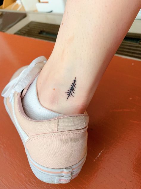 I got this flash tattoo on Friday the 13th for $13! I got it at Village Pop Tattoo in Manhattan, I’m so happy with how it came out. It reminds me of Vermont and skiing in the mountains with my friends and family. #tattoo #minimalisttattoo #treetattoo #fridaythe13thtattoo #tattoos #tinytattoo #smalltattoo Small Pine Tree Tattoo Simple, Simple Evergreen Tree Tattoo, Tiny Evergreen Tree Tattoo, Fine Line Evergreen Tattoo, Tiny Pine Tree Tattoo, Dainty Tree Tattoo, Vermont Tattoo Ideas, Tattoos For Women On Hand, Ski Tattoo Simple