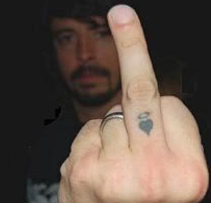 Halo over heart, left hand, middle finger. I am in love. Dave Grohl Finger Tattoo, Dave Grohl Tattoo, Foo Fighters Tattoo, Rockstar Tattoo, Nirvana Tattoo, Halo Tattoo, Fighter Tattoo, Middle Finger Tattoos, Pretty Poison