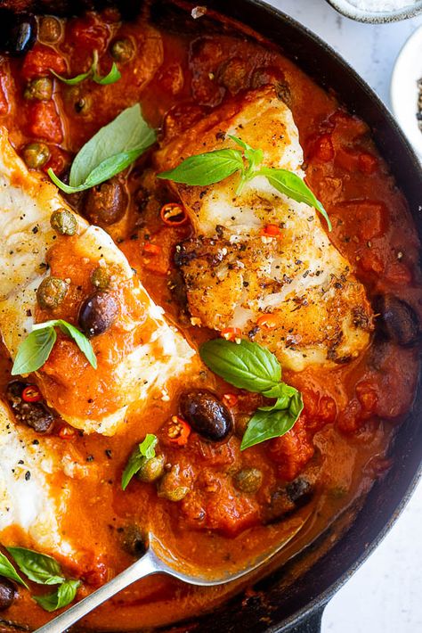 Seared Fish in Puttanesca Sauce - Simply Delicious Cast Iron Recipes Dinner, Fish Dishes Recipes, Pasta Puttanesca Recipe, Fish Stew Recipes, Puttanesca Sauce, Seared Fish, Pasta Puttanesca, Seafood Entrees, Easy Fish Recipes