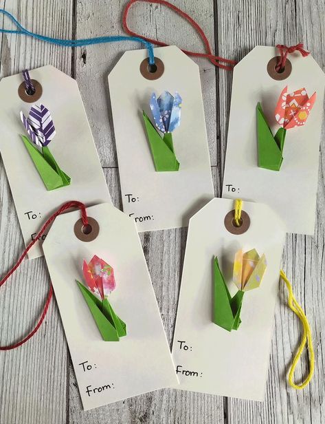 A set of hand-folded origami tulips are ideal for adding a handmade touch to your gift Tulip Gift Ideas Diy, Tulip Paper Craft, Tulip Origami Easy, Mini Paper Tulips, Origami Flowers Tulip, Tulip Origami, Large Gift Tags, Origami Cards, Creative Origami