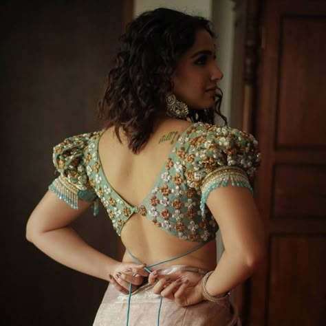 Latest and trendy designer blouses 2021 by Sruti Kannath! Choli Blouse Design, Saree Blouse Styles, Blouse Designs Catalogue, Backless Blouse Designs, New Saree Blouse Designs, Latest Model Blouse Designs, Lehenga Blouse Designs, Fashionable Saree Blouse Designs, Blouse Back Neck Designs