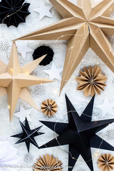 Today, I'm sharing how to make 3D paper stars in an easy, step-by-step tutorial. Learn how to make 8 pointed, 3D paper star decorations for your house or to use as gift hangers. Three-dimensional paper stars are simple to make and look amazing grouped together in different sizes. Add some string for hanging your paper star or simply place them on a shelf amongst your other Christmas ornaments. Diy 8 Point Paper Star, Paper Stars With Lights, Origami Stars Christmas, 3 D Stars From Paper, Paper Star For Christmas Tree Topper, Diy Star Hanging Decorations, Paper 3d Ornaments, 3d Star Decoration, Diy Star Paper Lantern