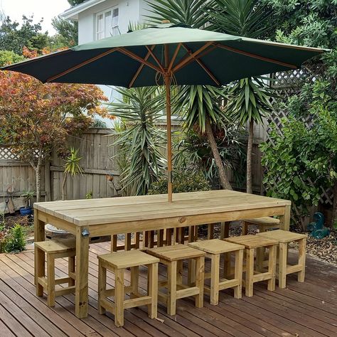 "Downloadable DIY plans with step-by-step instructions and pictures. Easily build this outdoor sturdy farmhouse table. A table capable of seating 12 people. At 8ft (2439mm) long and 39-1/2\" (1003mm) wide it is inexpensive to make and is a simple construction.  I originally made this table as part of an outdoor setting for a family occasion. At the time of writing this (some four months after the build), the table had weathered the most part of a hot summer and the tabletop boards had shrunk lea Outdoor Tables Diy, Outdoor Table For 12, Homemade Outdoor Table, Diy Outdoor Furniture Wood, Diy Table Outdoor, Outdoor Furniture Plans Wood, 2x4 Outdoor Table, Farmhouse Picnic Table Diy, Diy Outdoor Table And Chairs