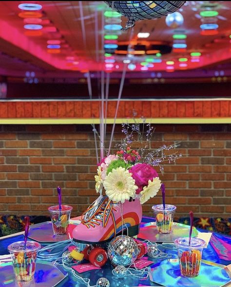 80s Theme Flower Arrangements, 70s Skating Party, 80s Themed Table Decorations, 70s Theme Table Centerpiece, 70s Party Centerpiece Ideas, 80s Theme Fundraiser, Dancing Through The Decades Centerpieces, 70s Theme Prom, 70s Theme Sweet 16