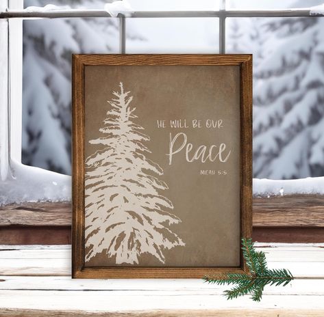 He will be our peace. Micah 5:5. This lovely wood sign with a textured brown and beige design is printed on 100% canvas. The frame is made of pine wood and finished with a walnut stain to enhance the natural grain. The box framed wall decor will make a beautiful gift for someone special this holiday season. Created by Made to Shine Design. SIZE:   8" x 10"  (Overall Size with Frame is 8 1/2" x 10 1/2" ) The 1 1/2" deep sides allows the frame to stands on a shelf or table, or you can hang on the wall directly off the frame. MATERIAL: White 100% cotton canvas for printing Stained pine wood frame  DETAILS: Wood box frames are made of pine and stained with a smooth, matte finish. Printable white art canvas is made from 100% cotton, has a matte texture.  Both the canvas prints and the frames ar Wood Signs For Christmas, Printable Christmas Wall Art, Small Signs, Merry Christmas Signs, Framed Christmas Signs, Wooden Signs For The Home, Christmas Decor Signs, Farmhouse Christmas Signs, Cute Christmas Signs