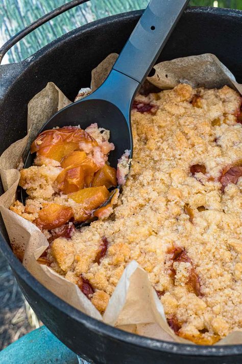 Oven Peach Cobbler, Dutch Oven Cobbler, Dutch Oven Peach Cobbler, Dutch Oven Desserts, Dutch Oven Camping Recipes, Fresh Peach Cobbler, Crisp Topping, Camping Under The Stars, Cobbler Easy